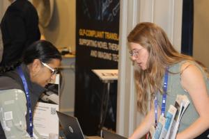 Photo from COINS 2025 Drug Conference - Drug_R&D_Badge_Pickup.JPG